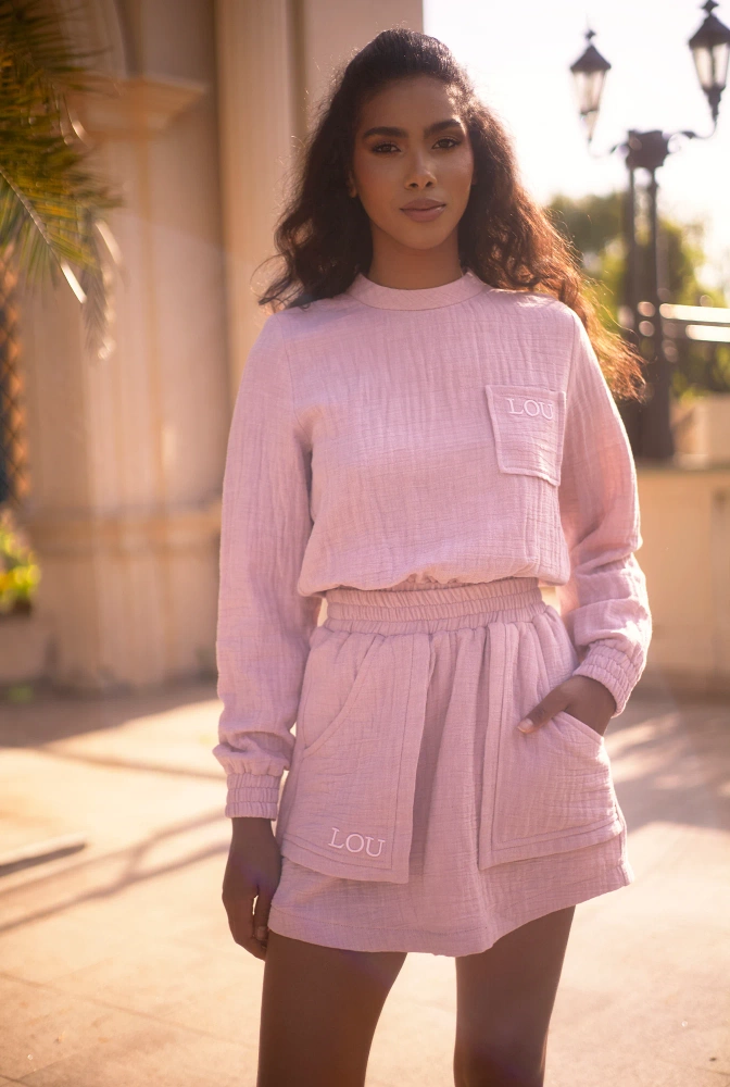 Kama - Set tuta rosa con minigonna e ricamo